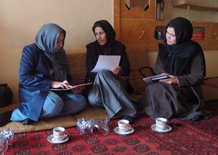 Women discussing farm management in Afghanistan